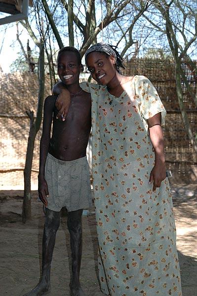 This image missed the first cut, but I couldn't resist the smile.  This kid has nothing -- but when have you last seen an American kid with a smile that big?