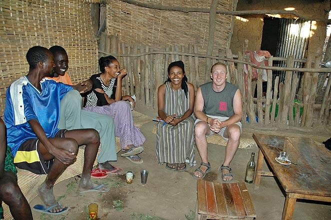 Sticking out like a sore thumb - Drinking home-made beer made from maize in a local bar in Omorate
