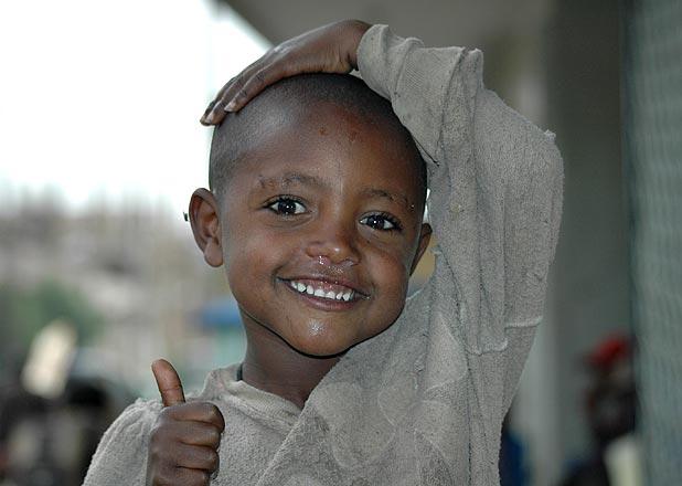 I had to joke that you could never take a good depressing photo of the street kids in Addis Ababa because they would always smile at you.