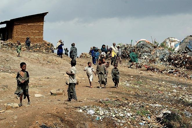 Kids living beside the garbage dump on the edge of town.