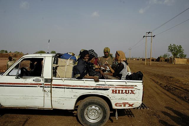 My first truck ride in Sudan.  Four more people somehow fit into the back of that truck.