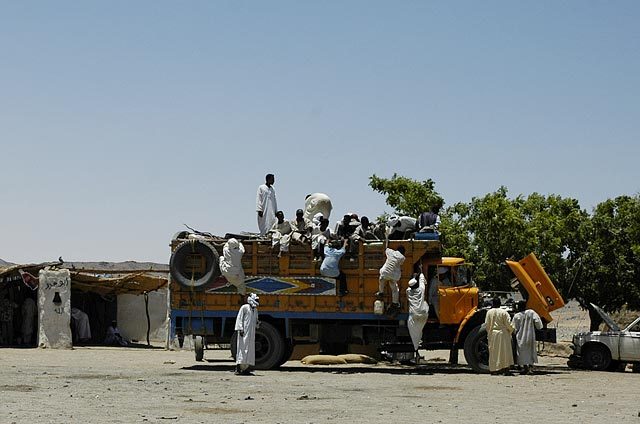 A rest stop somewhere in Northern Sudan - getting back on the truck.