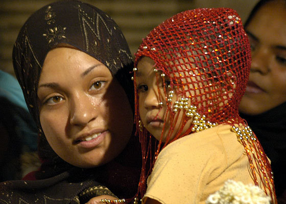 Woman and Child at the wedding.  It wasn't actually the wedding, but a bridal party the night before the wedding.