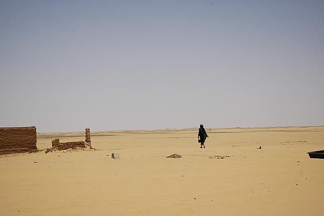 A rest stop in the middle of the desert.  Amazingly there is water available there brought up from deep wells.