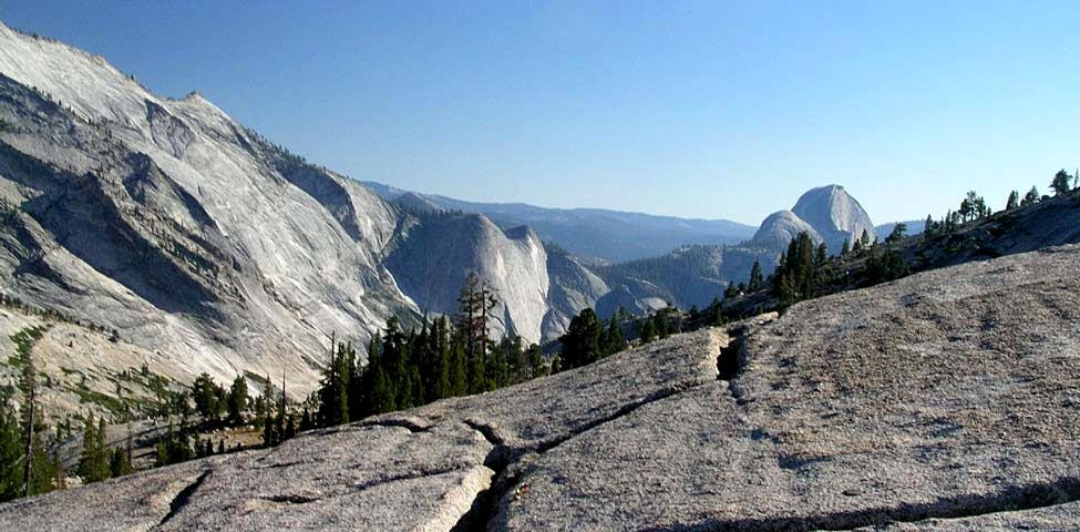 Tenaya Canyon with a view of Half Dome in the distance.