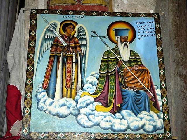 St. George is also famous for supposedly bringing the Ark of the Covenant to Ethiopia.  This painting shows St. George riding to Ethiopia, with an Angel, on a cloud.  The wrapped package in his hand is the Ark.