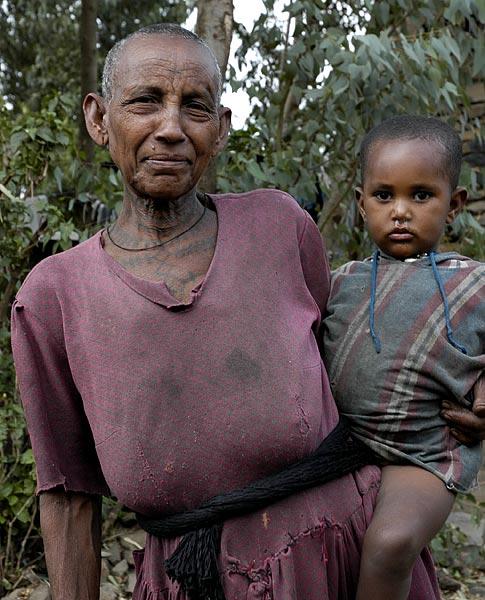 Woman and child Gonder - notice the tatooing on her neck.