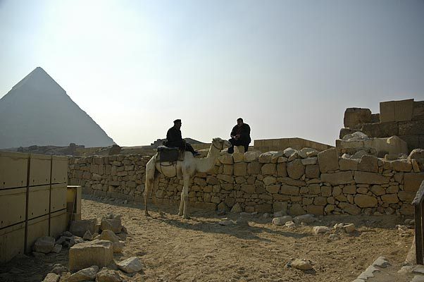 Tourist police on Camelback at the Pyramids in Cairo.