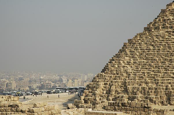 The Great Pyramid towering over the Giza neighborhood in Cairo.