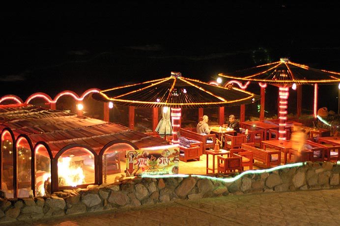 Once upon a time backpackers in Dahab camped in the sand dunes, now the beach has been paved over, and the restaurants are covered in christmas lights.