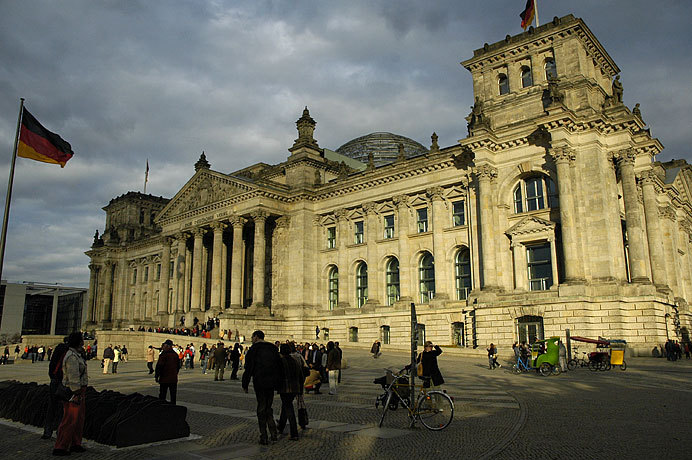 The Reichstag; Germany's Parliament House. Light makes the difference between a mediocre photo and a great photo - this amazing light shone through a hole in the clouds for less than 3 minutes, and then it was gone.