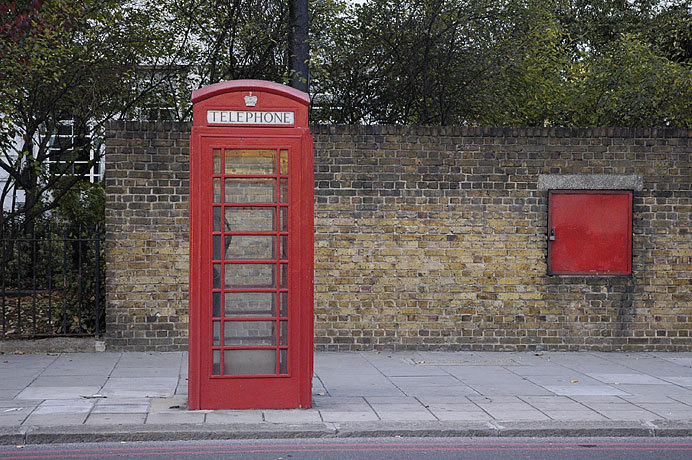 I decided photographing red phonebooths was so absurdly stereotypically touristy, that I had to do it myself.  I like balance and matching colors in this photo.