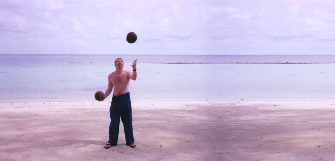 Juggling coconuts on the beach in Thailand. This was from my frist trip to Thailand (1997?)