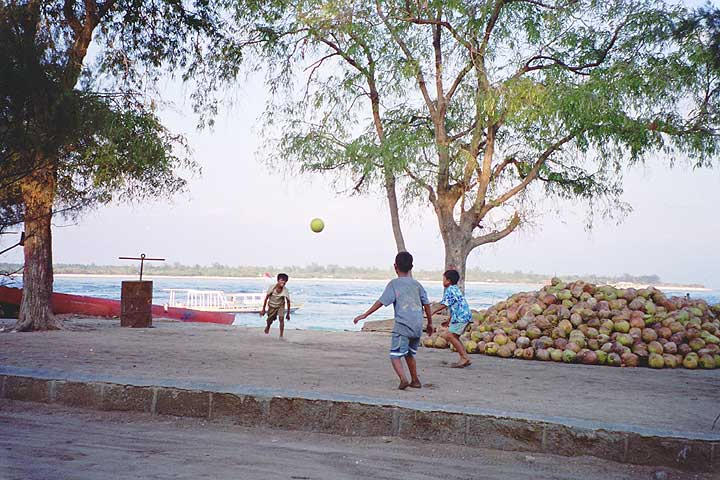 Kids playing soccer.
